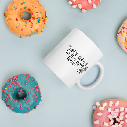 "Let's take it to the next level" - Office Jargon Mug