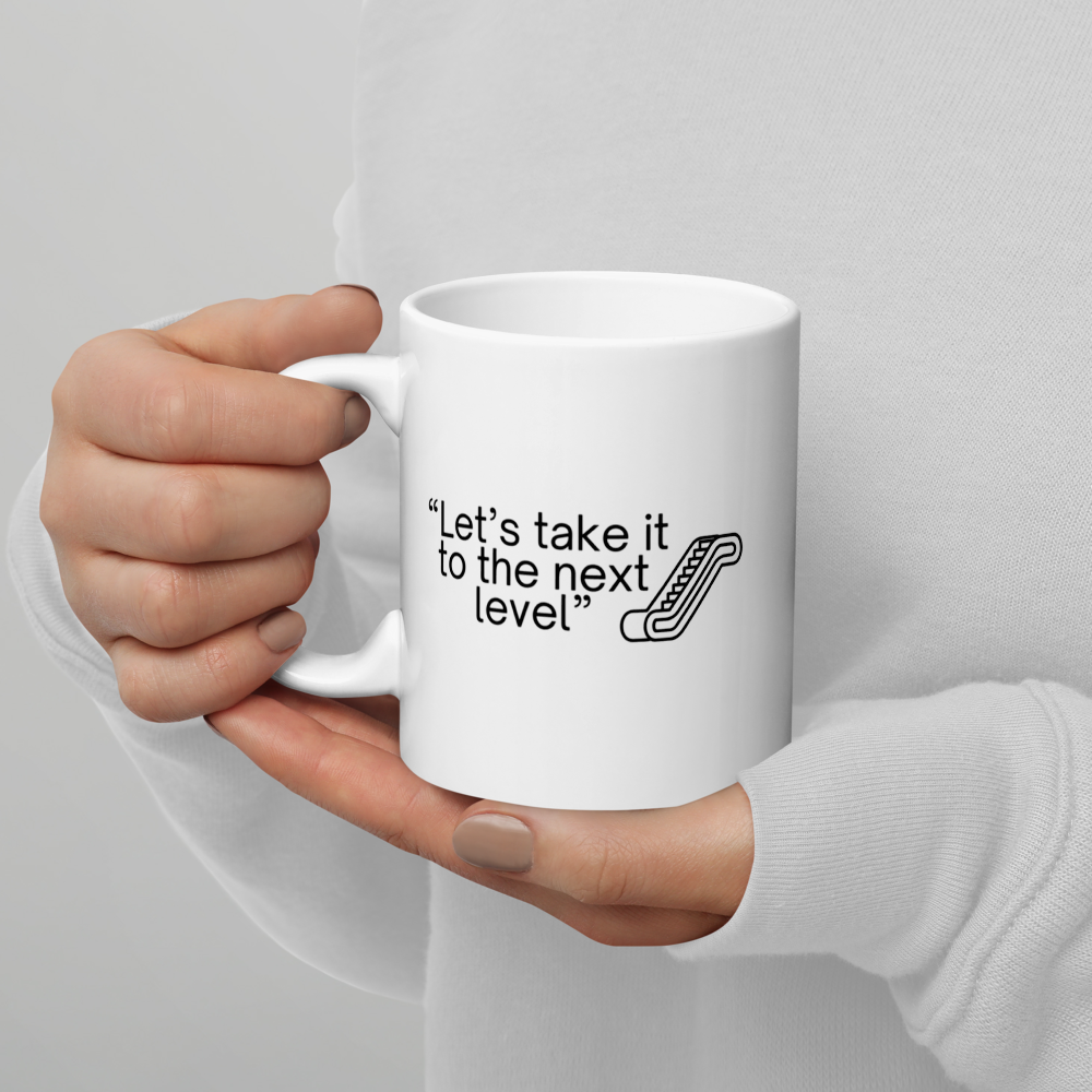 "Let's take it to the next level" - Office Jargon Mug