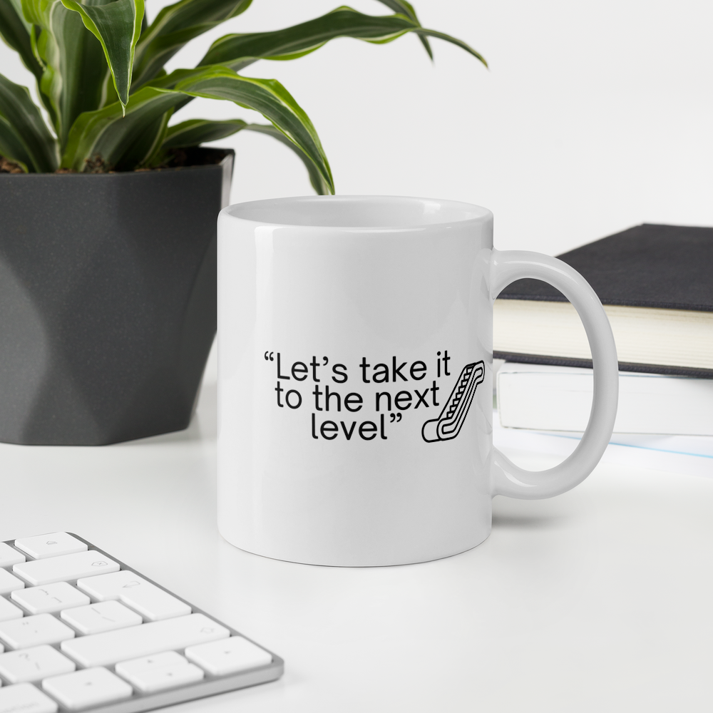 "Let's take it to the next level" - Office Jargon Mug